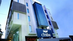 A modern building with a sign reading "CITRINE". - Citrine Hotel (Bengaluru)