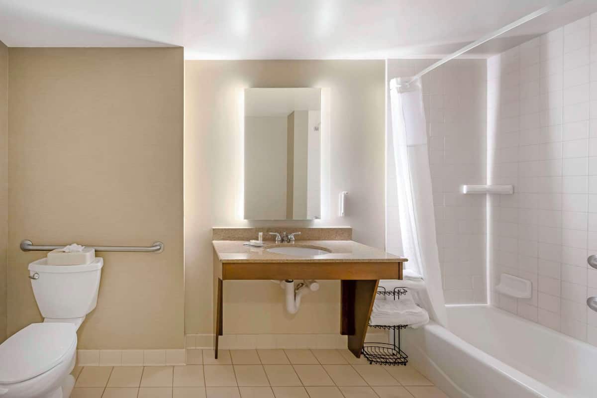 room, 1 king bed, accessible, non smoking (non- pet friendly) | in-room safe, desk, laptop workspace, iron/ironing board