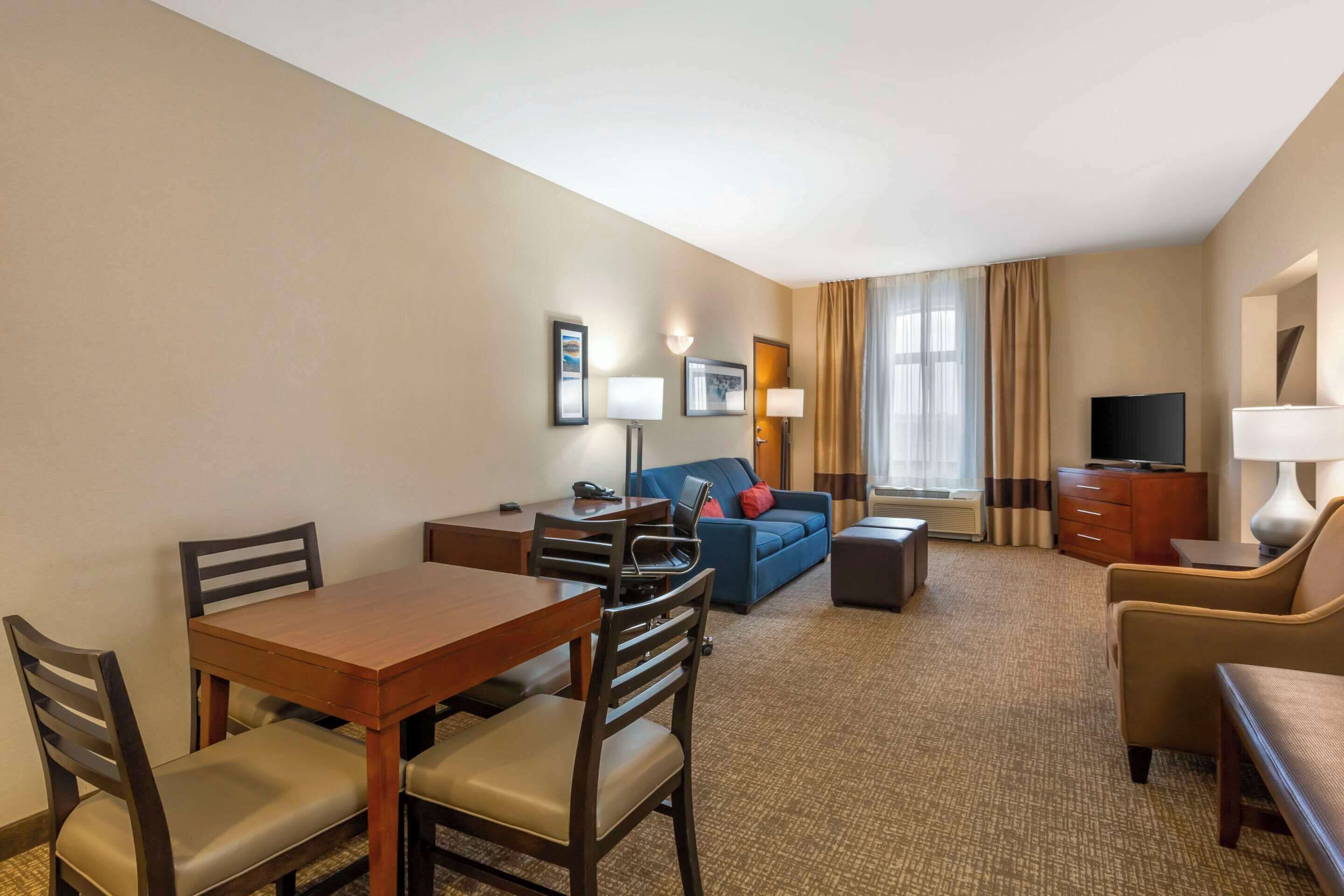 suite, 1 king bed with sofa bed, non smoking, hot tub (non- pet friendly) | in-room safe, desk, laptop workspace, iron/ironing board