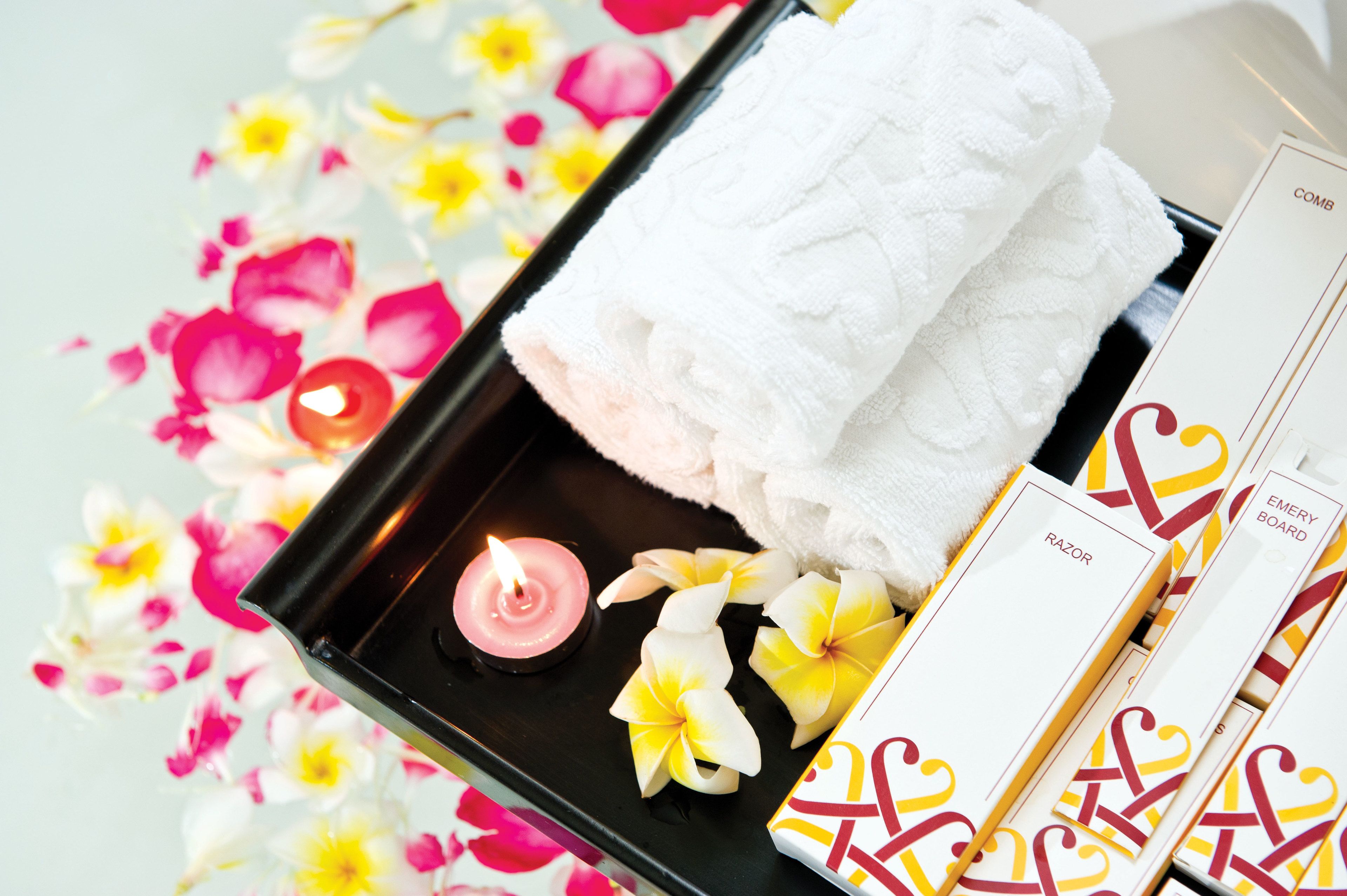 combined shower/bathtub, designer toiletries, hair dryer, bathrobes