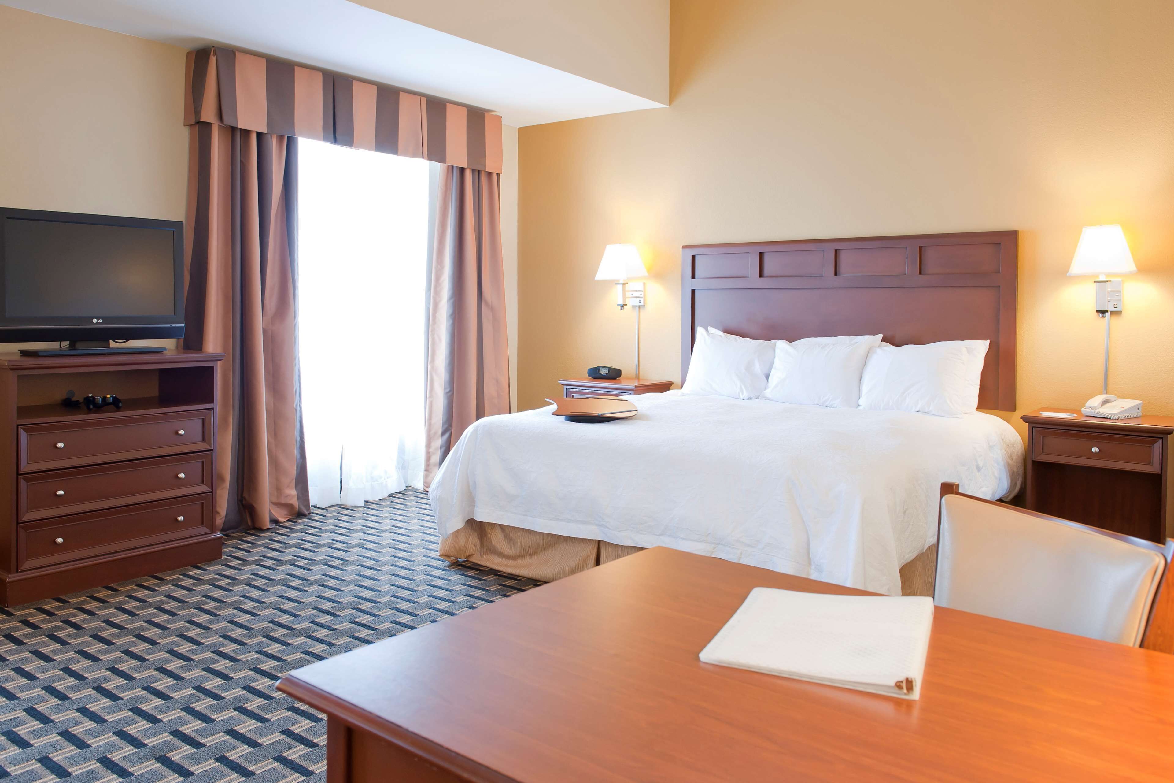 studio, one king bed, non-smoking | pillow-top beds, in-room safe, blackout curtains, iron/ironing board