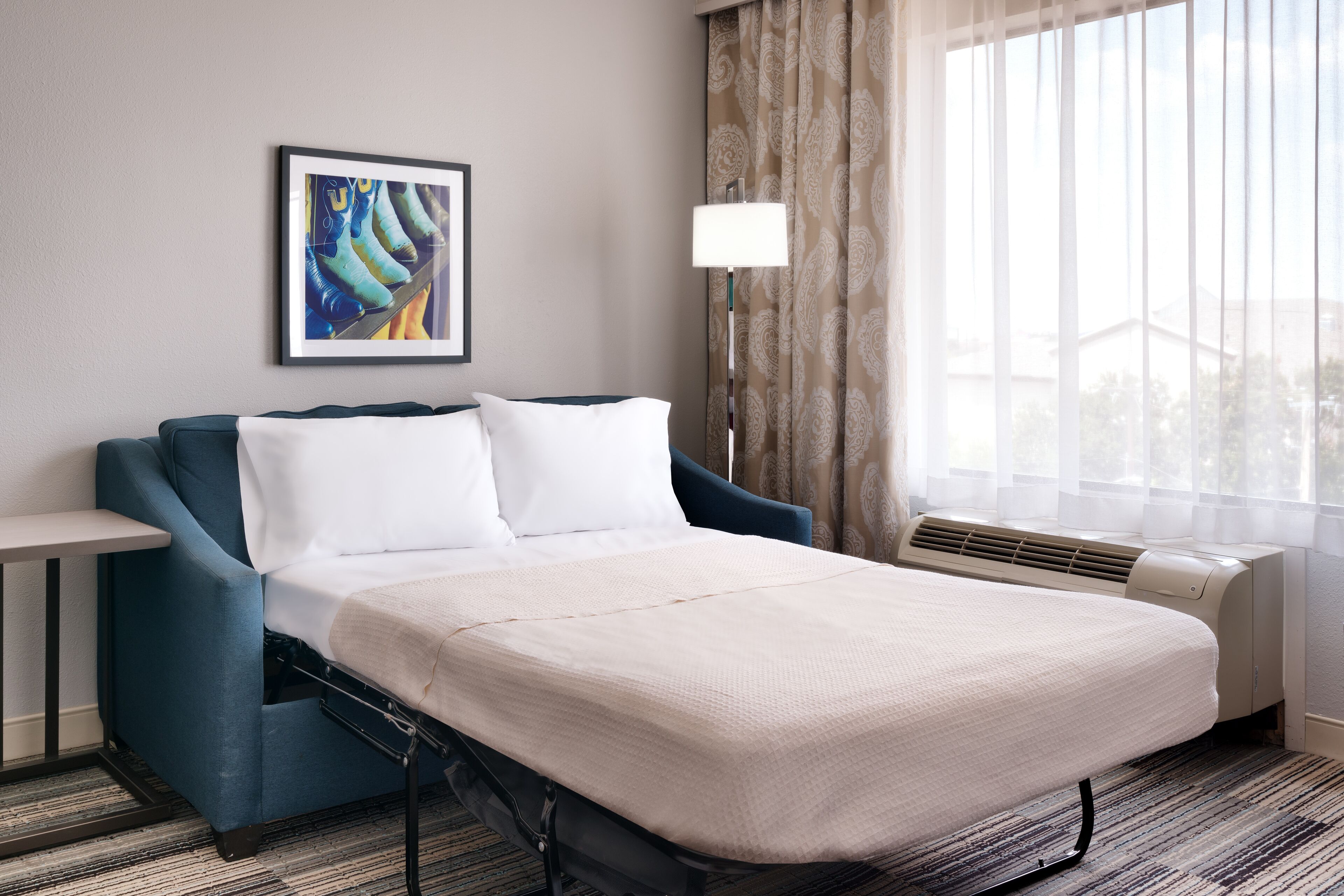 desk, laptop workspace, iron/ironing board, free cots/infant beds