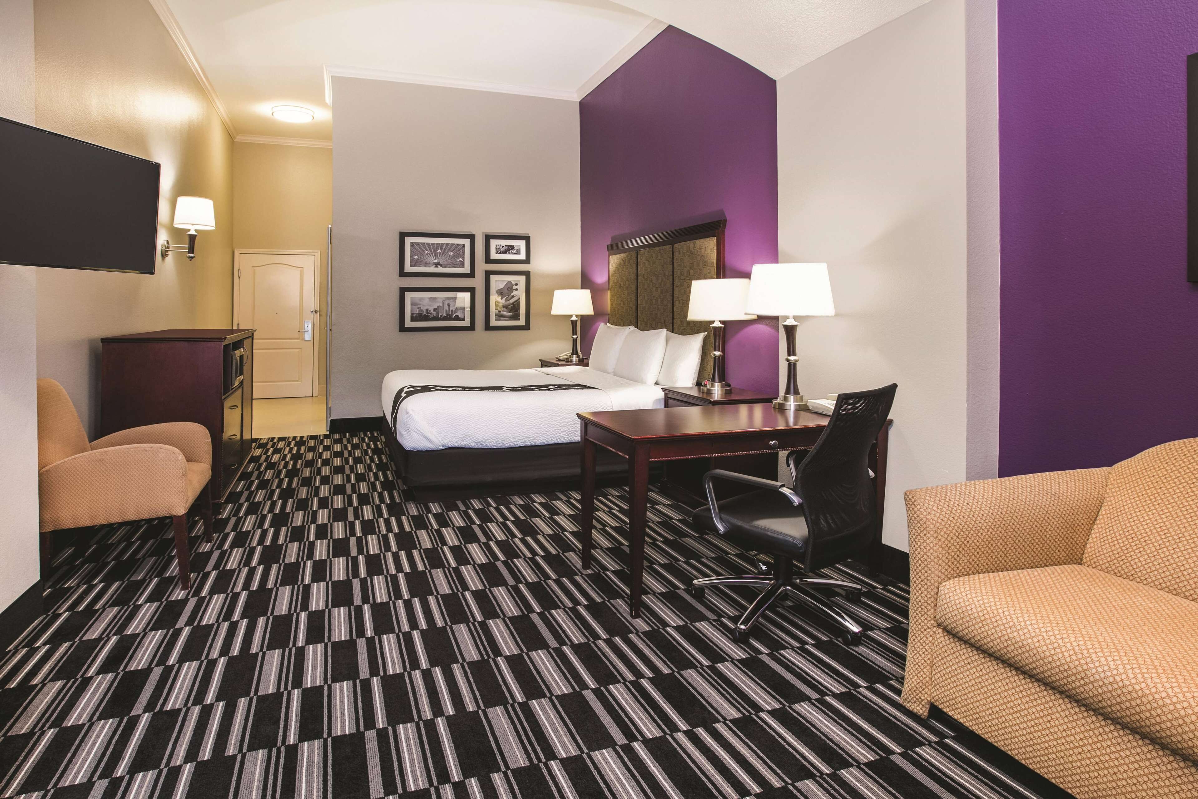 deluxe suite, 1 king bed, non smoking | premium bedding, desk, laptop workspace, blackout curtains