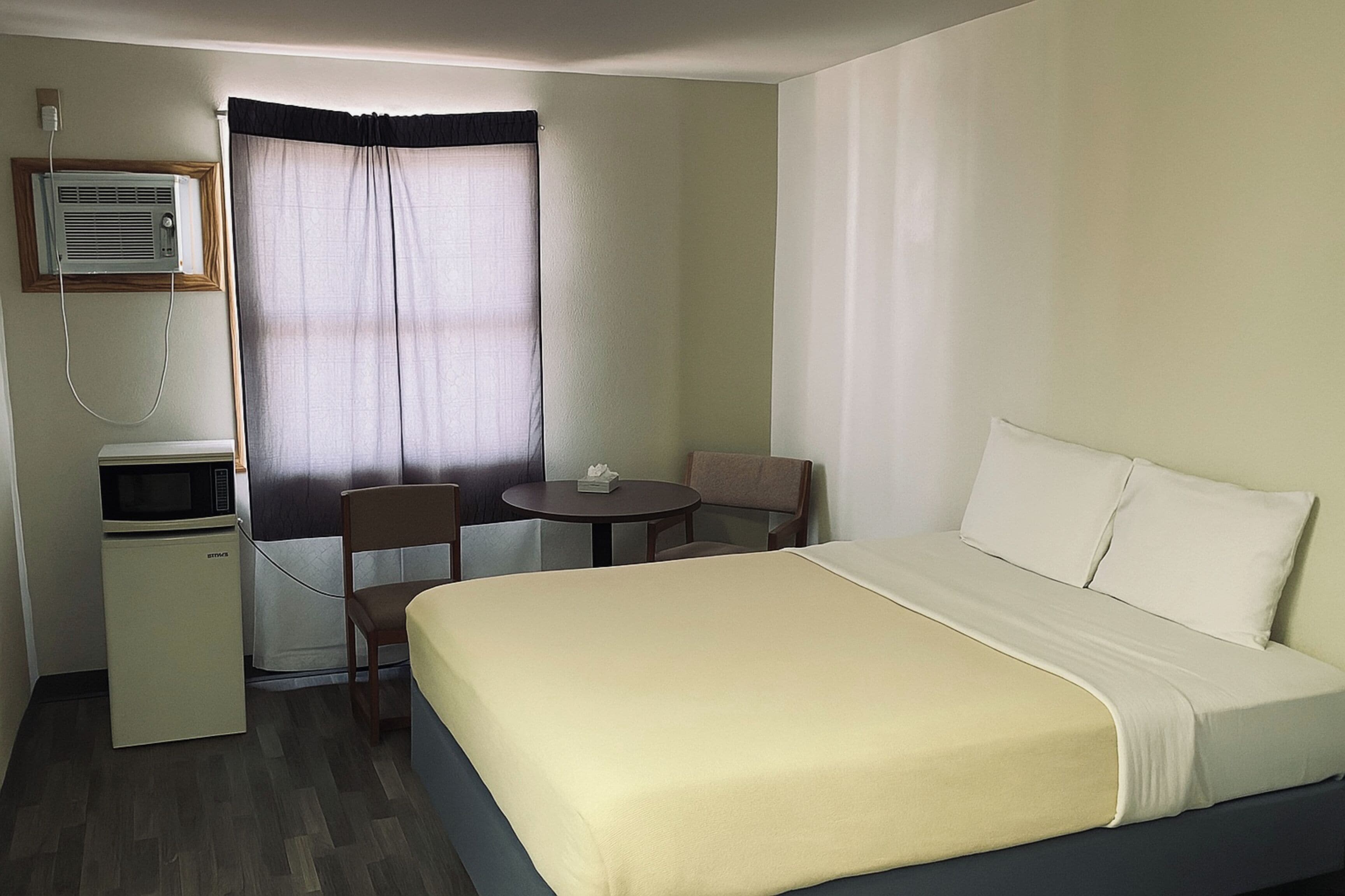 Room (3 Queen Beds) | In-room safe, iron/ironing board, free WiFi, bed sheets