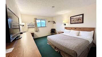 Room, 1 King Bed, Non Smoking | In-room safe, iron/ironing board, free WiFi, bed sheets