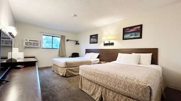 Room, 2 Queen Beds, Non Smoking | In-room safe, iron/ironing board, free WiFi, bed sheets