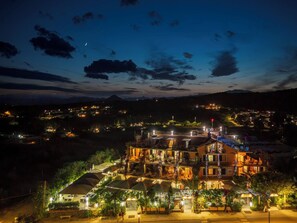 Front of property - evening/night - Aparthotel Domus De Janas Sul Mare (Bari Sardo)