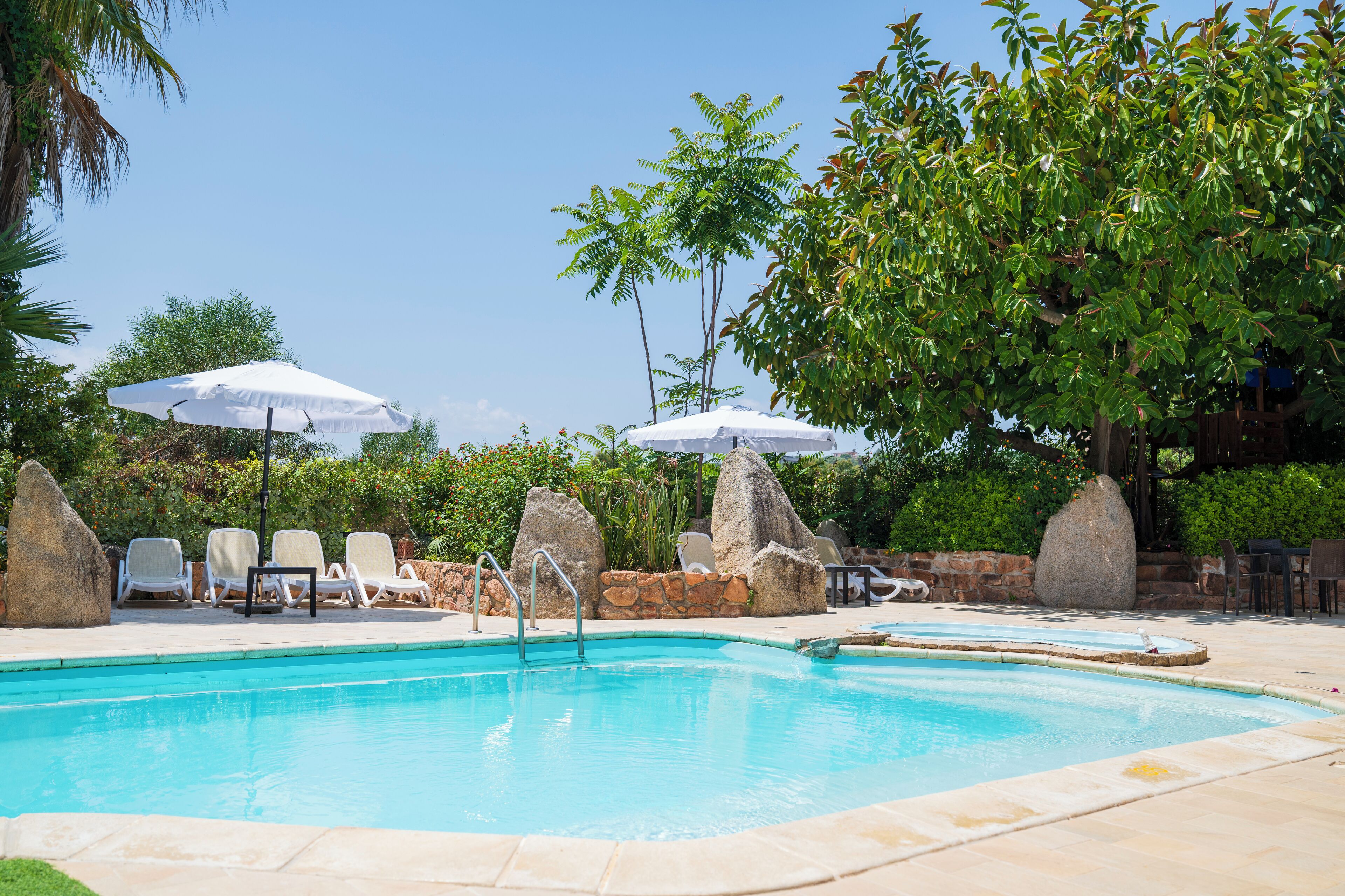 Seasonal outdoor pool, pool umbrellas, pool loungers