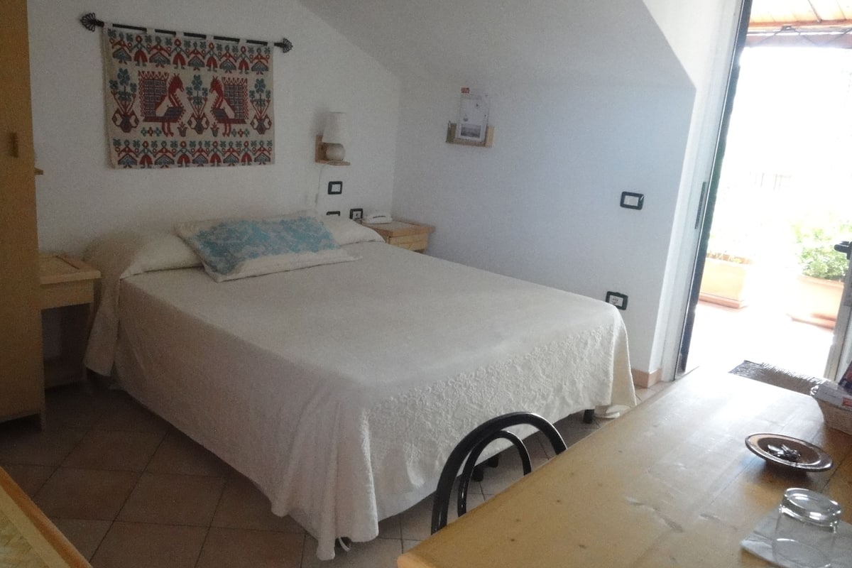 Basic Double Room, Private Bathroom (Mansard) | Minibar, in-room safe, individually decorated, individually furnished