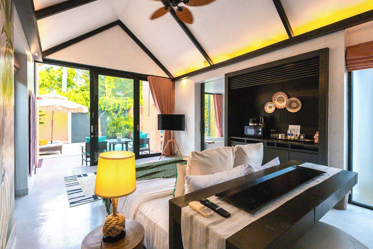 tropical pool villa | minibar, in-room safe, desk, laptop workspace