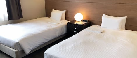 Estudio, 2 camas individuales | Ropa de cama de alta calidad y edredón