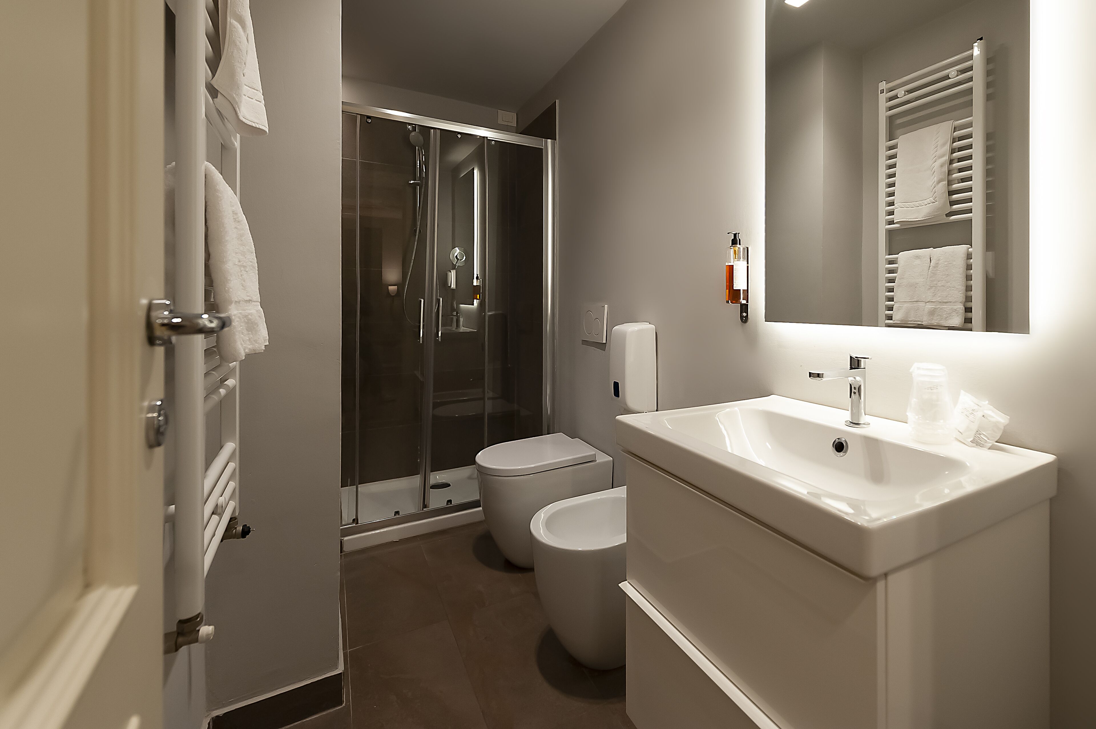 family room | bathroom | shower, free toiletries, hair dryer, bathrobes