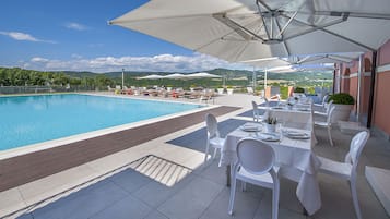 Outdoor pool, pool umbrellas, pool loungers