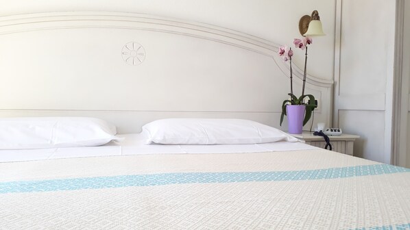 Egyptian cotton sheets, premium bedding, down duvets, minibar