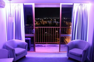 Minibar, desk, blackout curtains, iron/ironing board