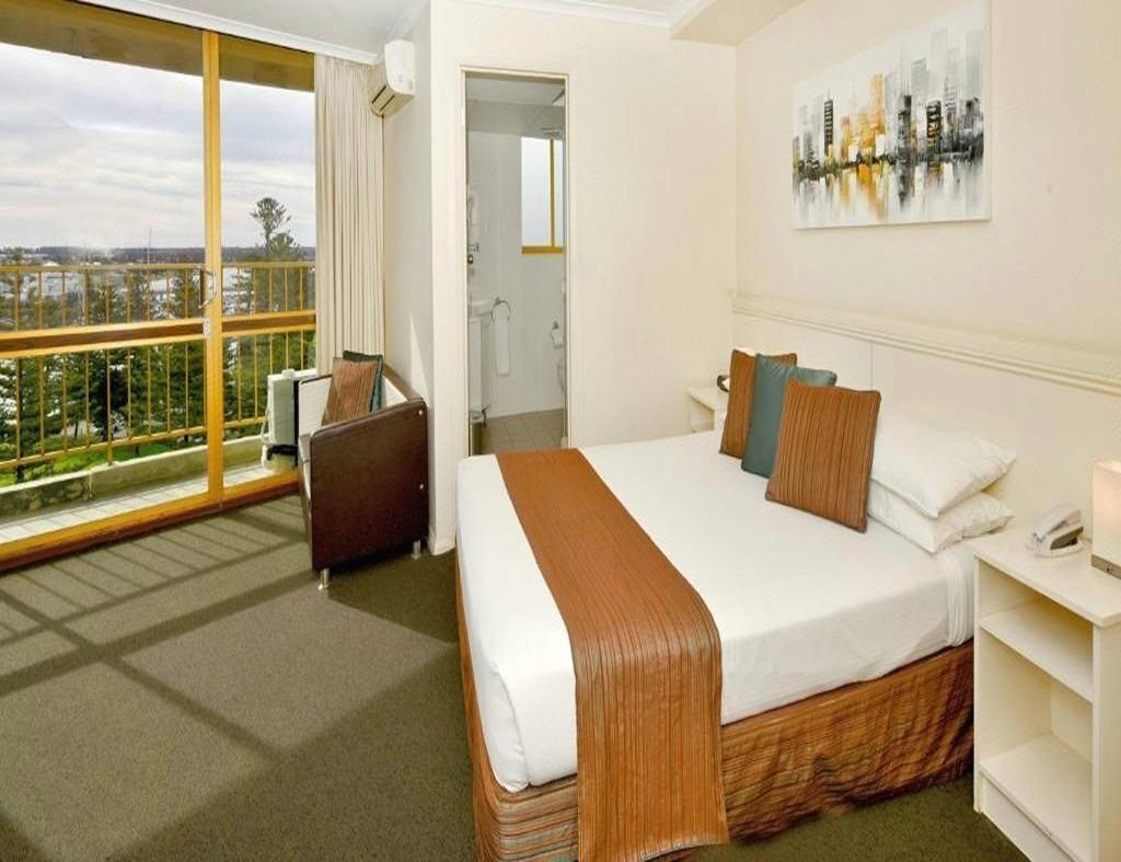 Minibar, desk, blackout curtains, iron/ironing board