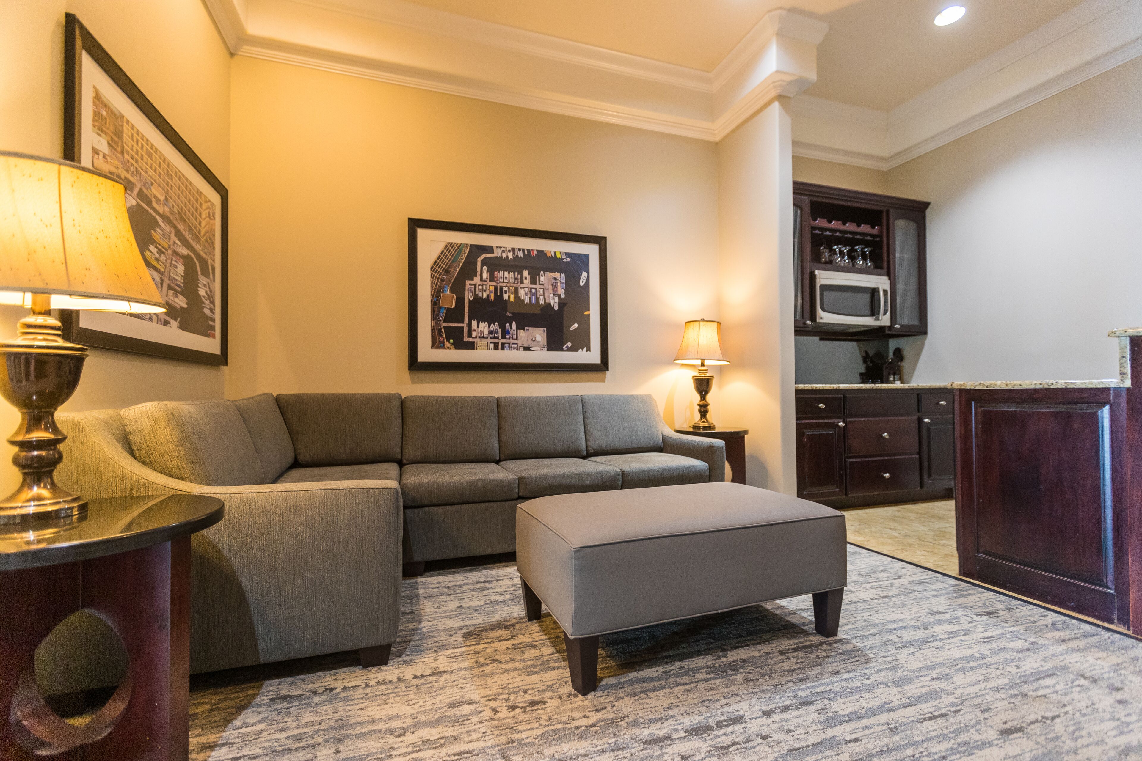 grand suite (two double beds) | living area | 42-inch lcd tv with digital channels, tv, dvd player