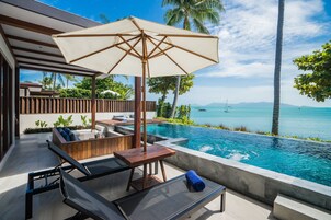 One Bedroom Beachfront Pool Villa | Minibar, in-room safe, desk, laptop workspace