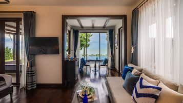 Two Bedroom Beachfront Grand Pool Villa | Living area | 43-inch LCD TV with satellite channels, TV