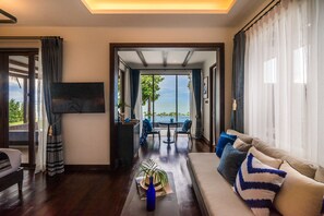 Two Bedroom Beachfront Grand Pool Villa | Living area | 43-inch LCD TV with satellite channels, TV - NH Collection Samui Peace Resort (Koh Samui)