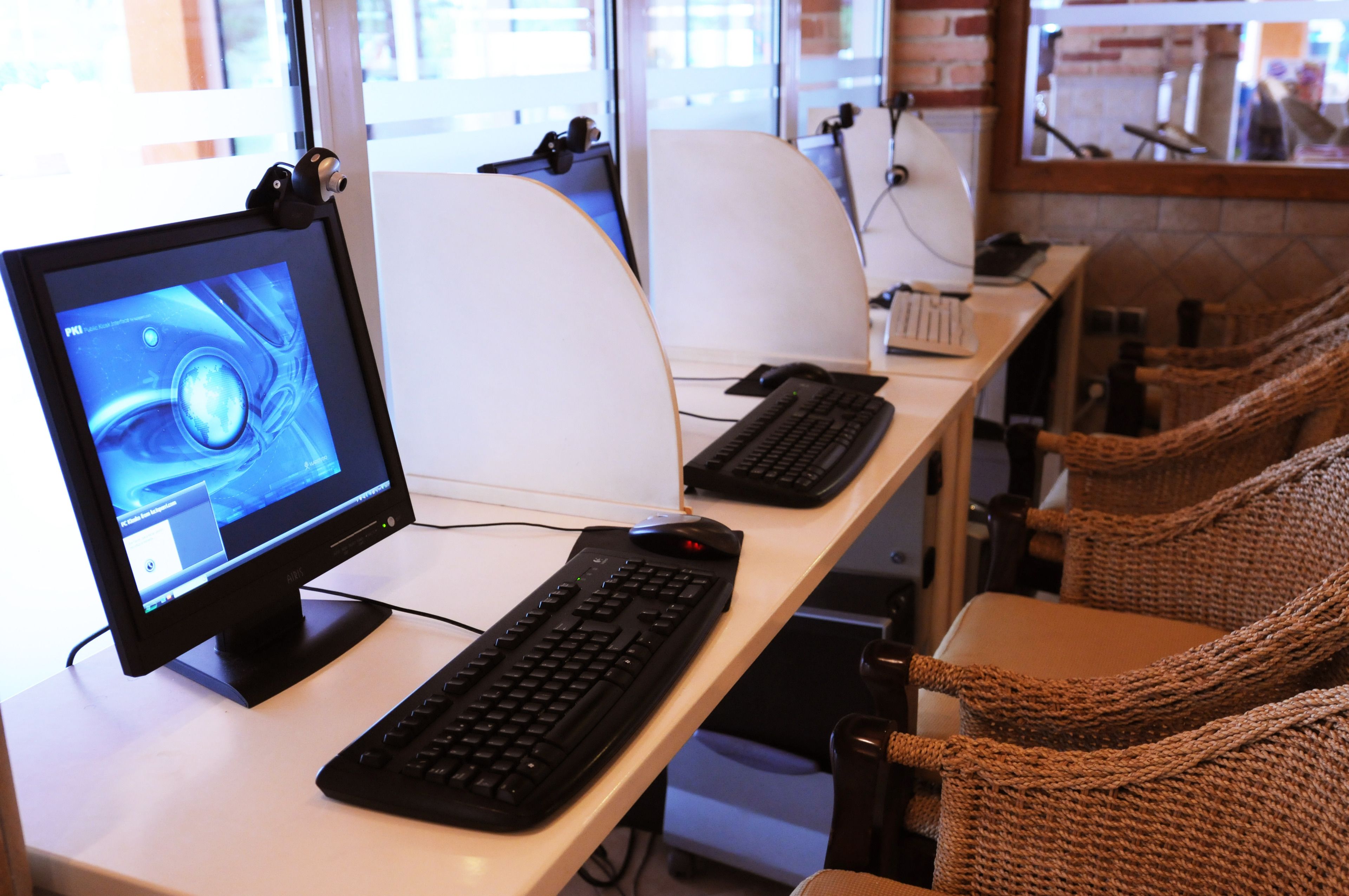 A computer workstation with a monitor, keyboard, and mouse.