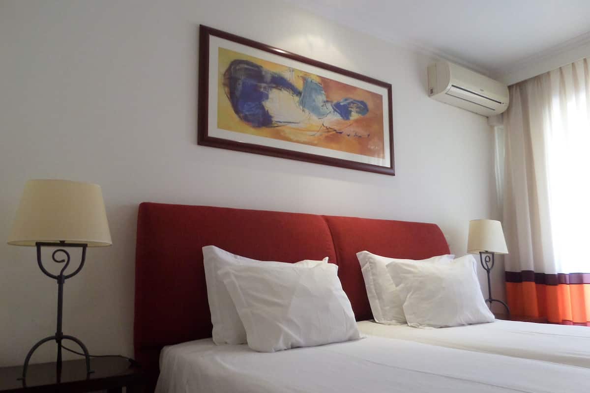 In-room safe, desk, blackout curtains, free cots/infant beds
