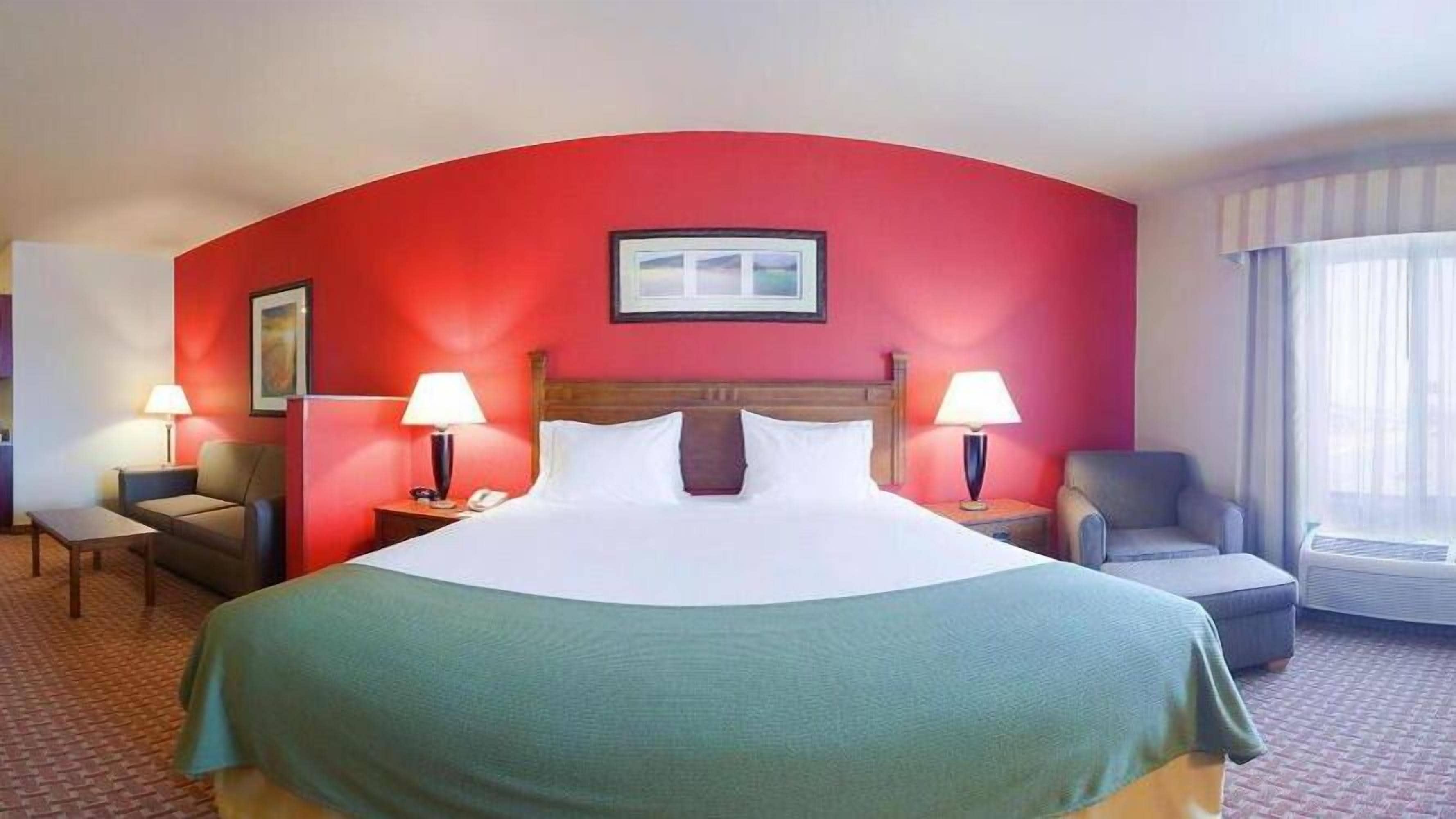 desk, blackout curtains, iron/ironing board, free cots/infant beds