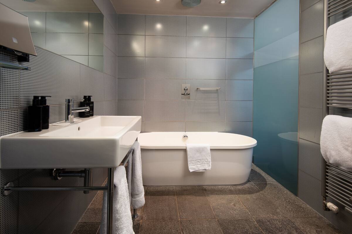 feature double room with balcony | bathroom | free toiletries, hair dryer, towels, soap