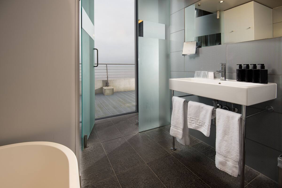 feature double room with balcony | bathroom | free toiletries, hair dryer, towels, soap