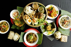 Savor the flavors of local cuisine with a variety of traditional dishes on display.