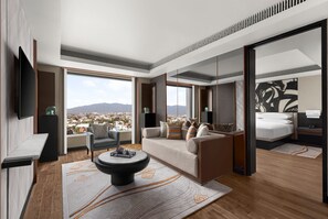 Club Suite, 1 Bedroom | Living area | 49-inch Smart TV with cable channels, TV