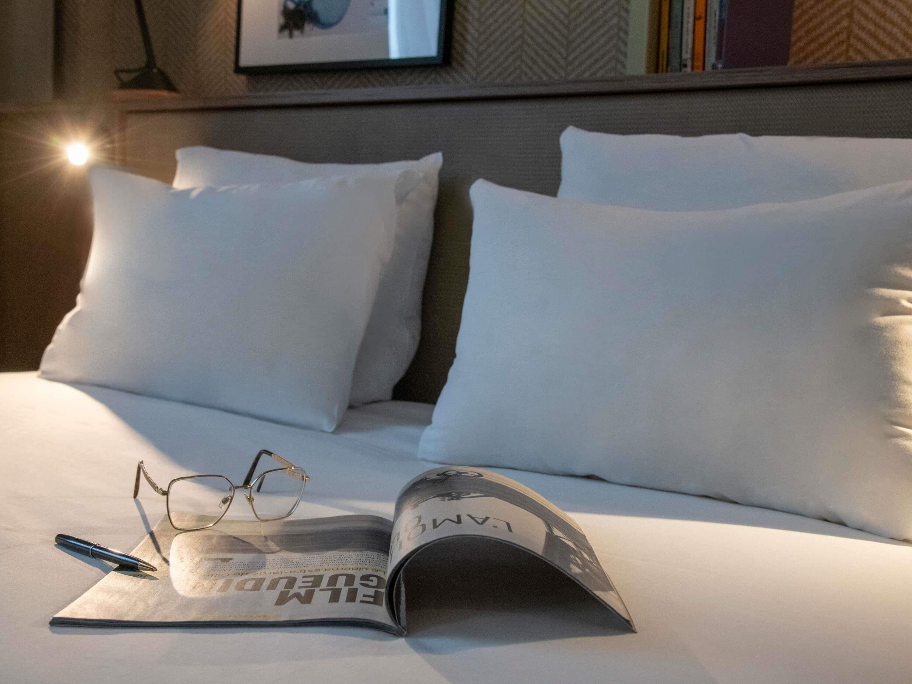 Suite superior, varias camas | Ropa de cama de alta calidad y minibar 