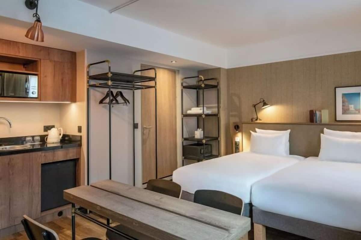Ropa de cama de alta calidad y minibar