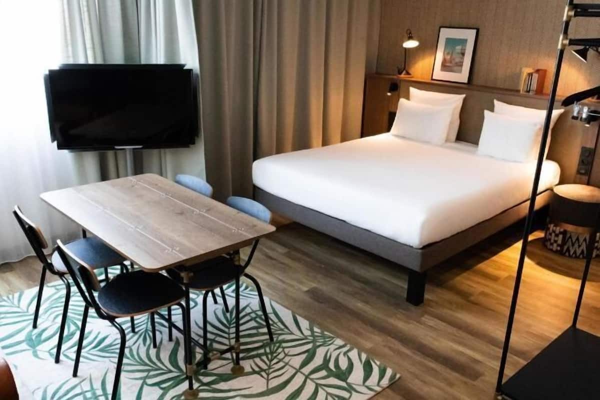 Ropa de cama de alta calidad y minibar
