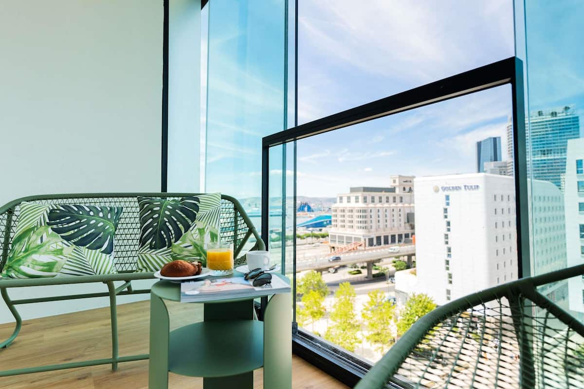 Superior Suite, Multiple Beds, Balcony | Minibar, in-room safe, desk, laptop workspace