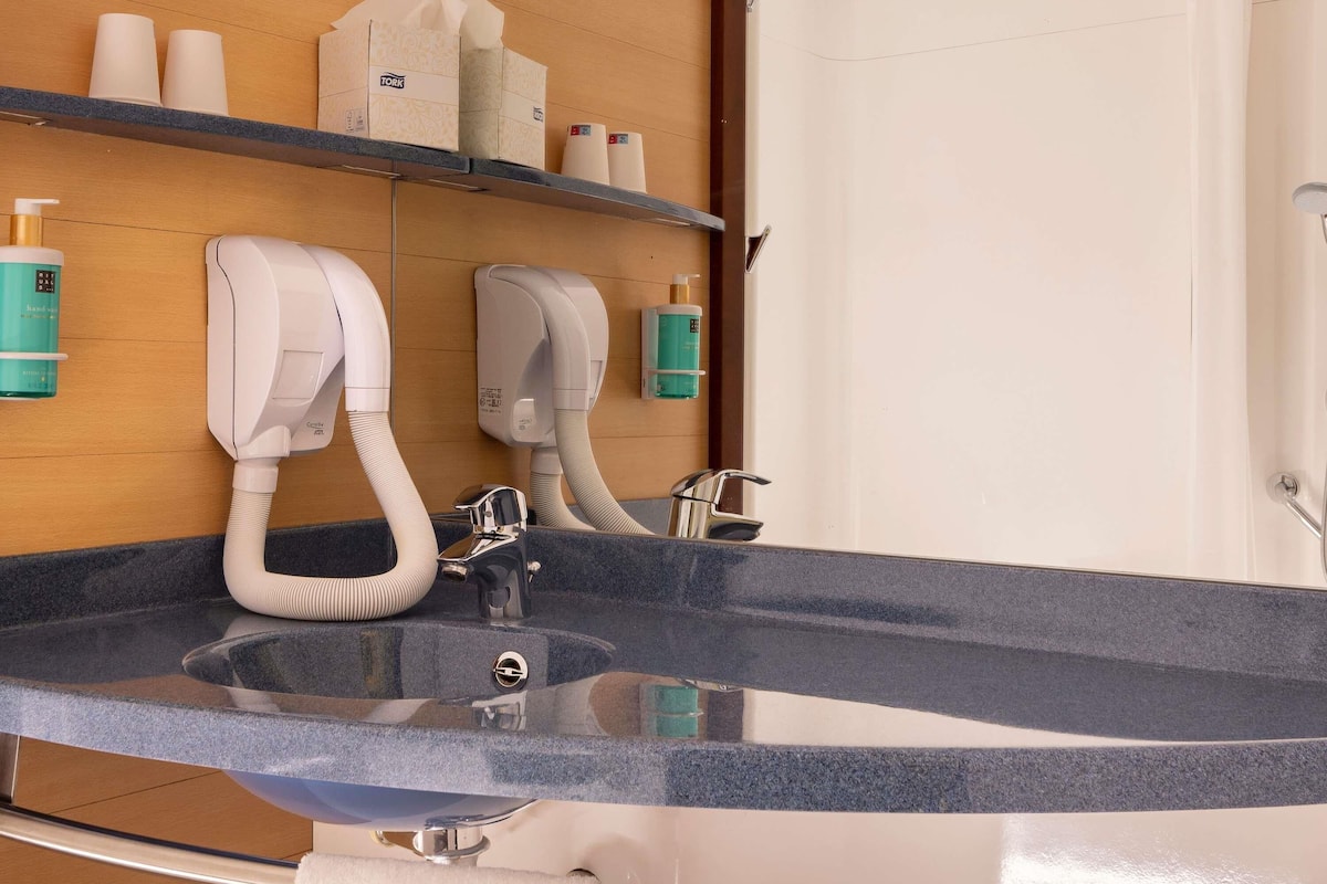 family suite, multiple beds | minibar, in-room safe, desk, laptop workspace