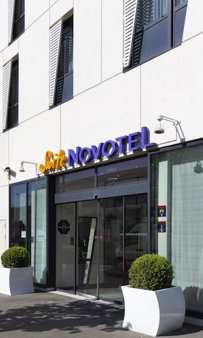 Welcome to Novotel, where a sleek entrance sets the tone for a stylish stay.