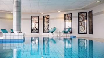 Indoor pool, a heated pool, open 7:00 AM to 9:00 PM, sun loungers