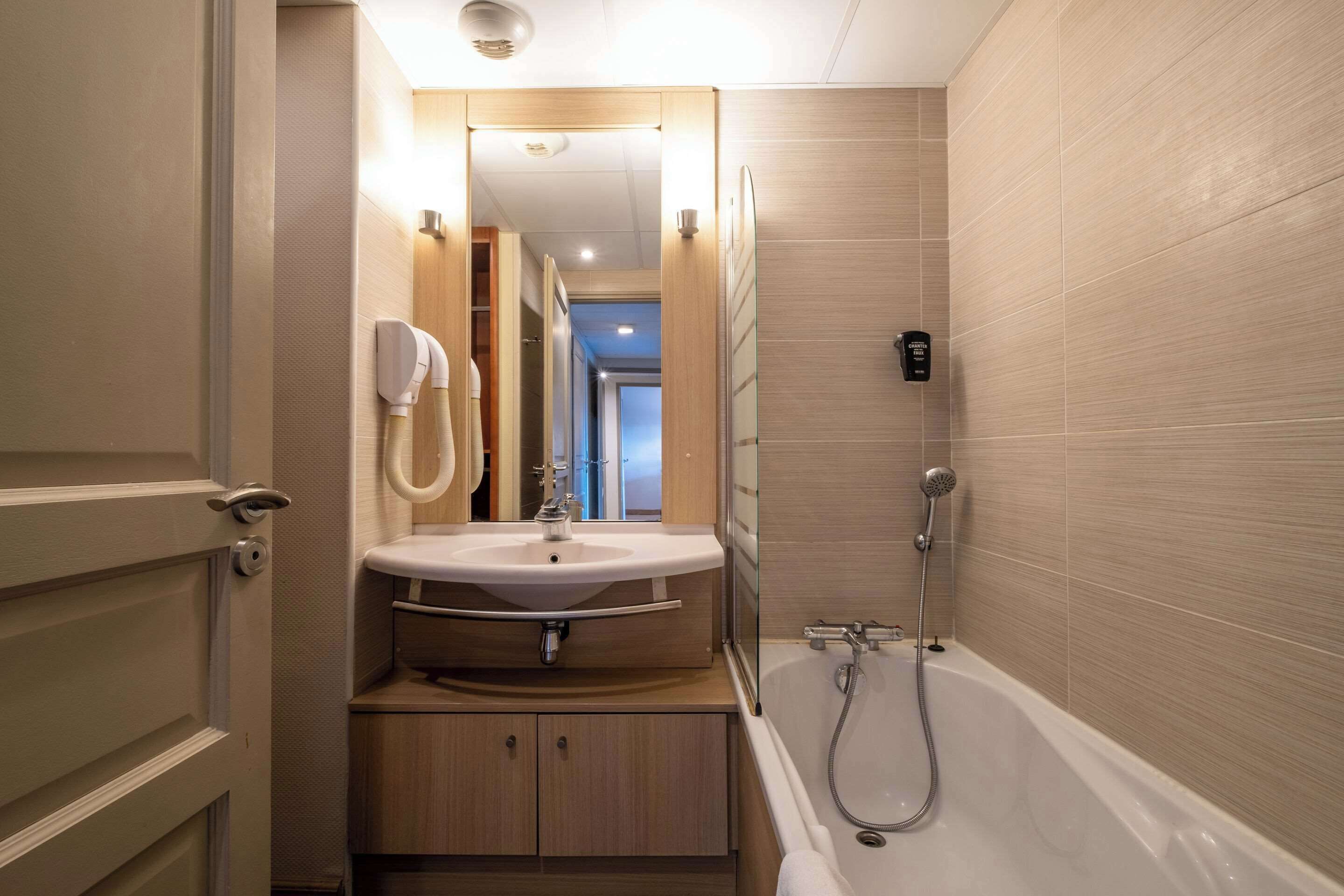 eco-friendly toiletries, hair dryer, towels