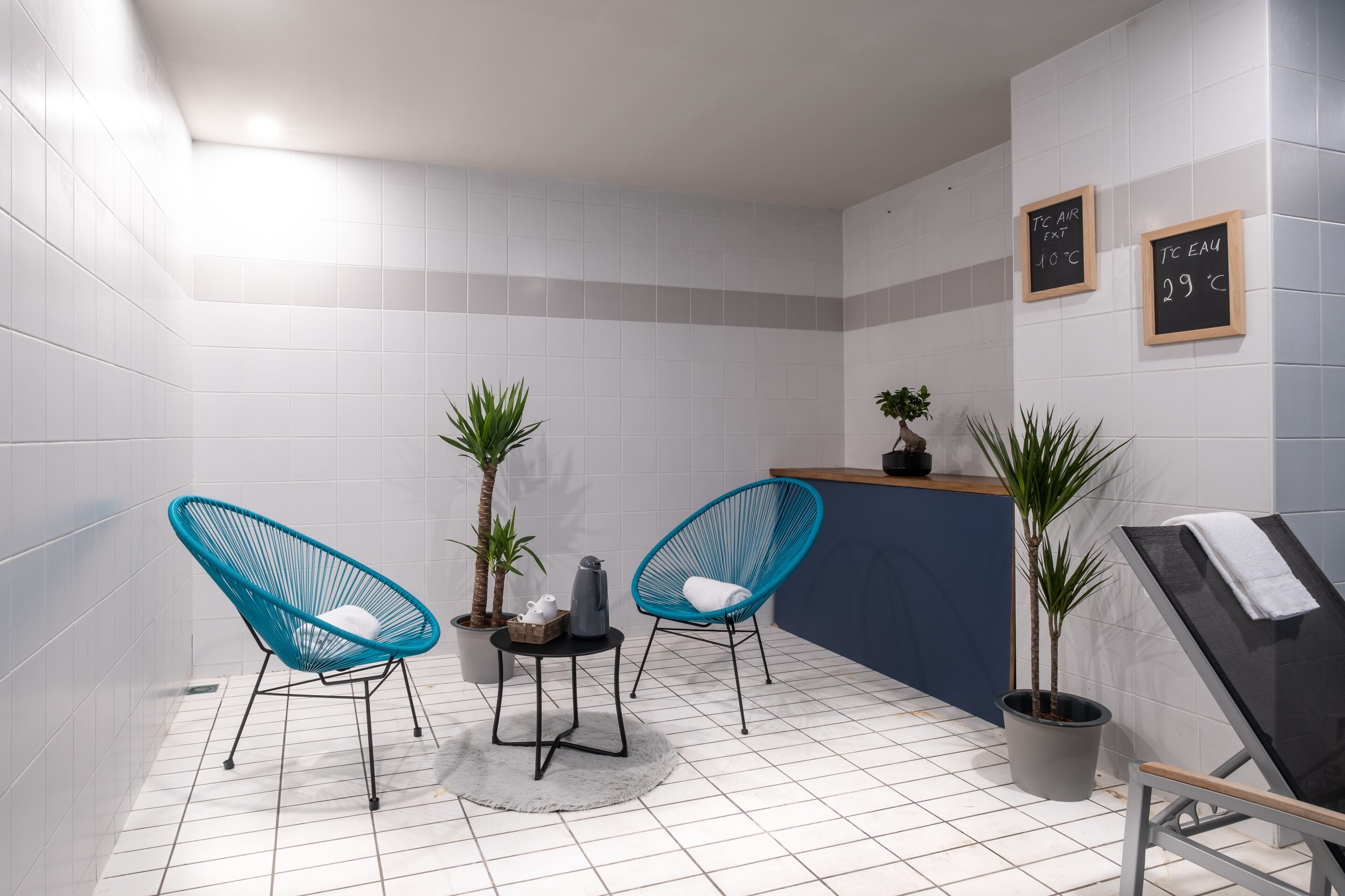 indoor pool, a heated pool, open 7:00 am to 9:00 pm, pool loungers