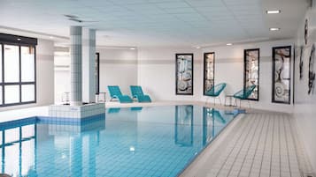 Indoor pool, a heated pool, open 7:00 AM to 9:00 PM, sun loungers