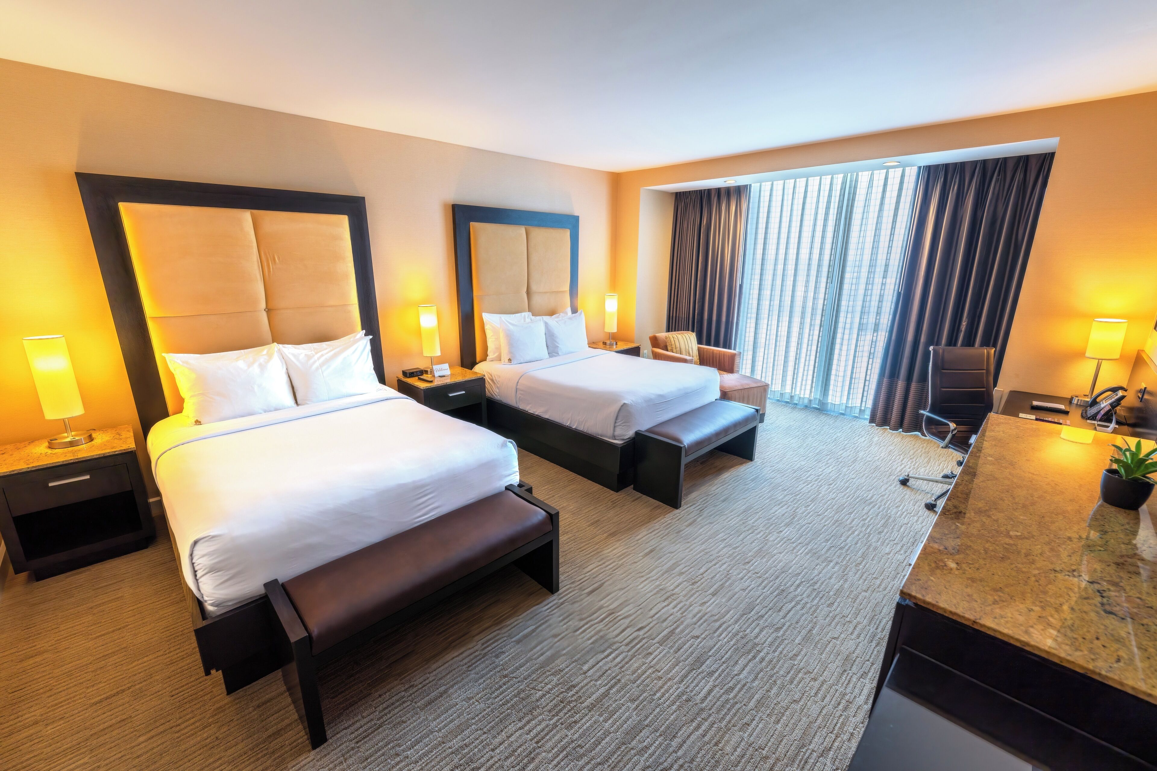 deluxe room, 2 queen beds | 1 bedroom, premium bedding, pillow-top beds, minibar