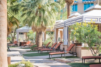 Outdoor pool, cabanas (surcharge), pool umbrellas at Agua Caliente Casino Rancho Mirage