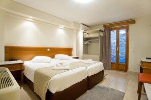 Habitació estàndard | Roba de llit d'alta qualitat i matalassos de la marca Select Comfort 