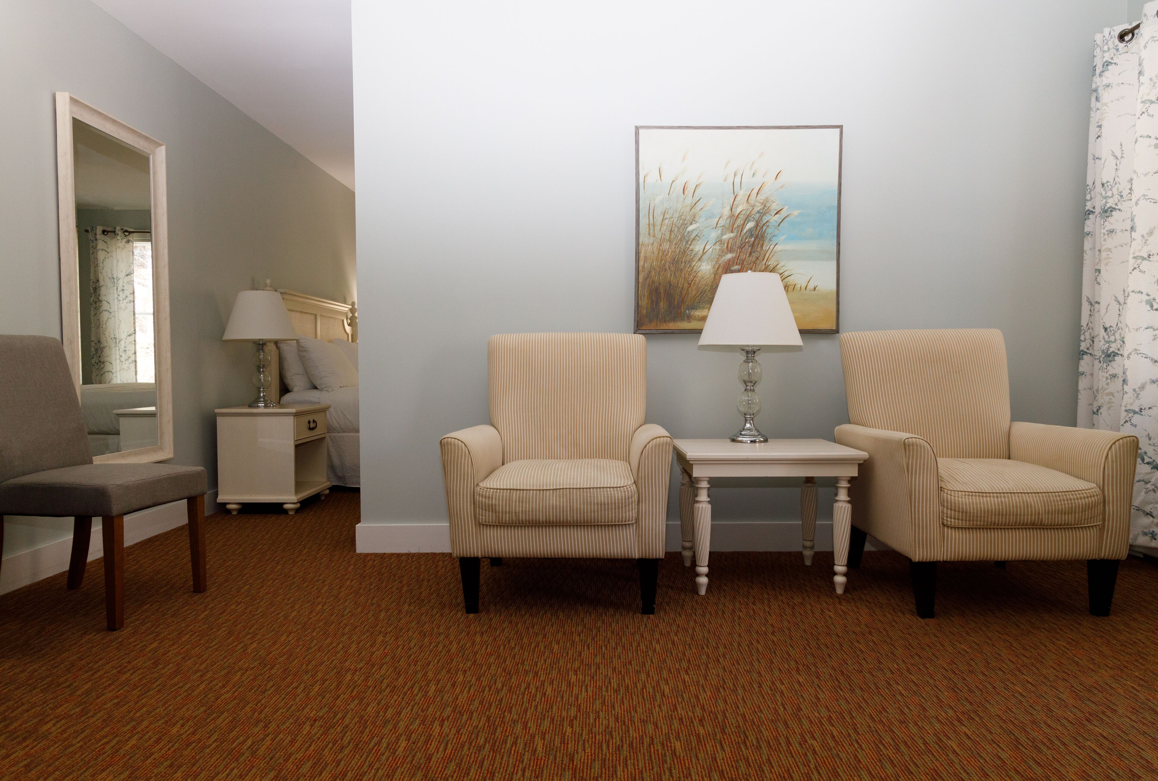 king room with jetted tub and fireplace | living area | 32-inch tv with satellite channels