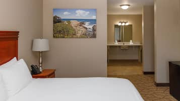 Habitación estándar, 1 cama King size, con acceso para personas discapacitadas, baño privado | Tabla de planchar con plancha, wifi gratis y ropa de cama