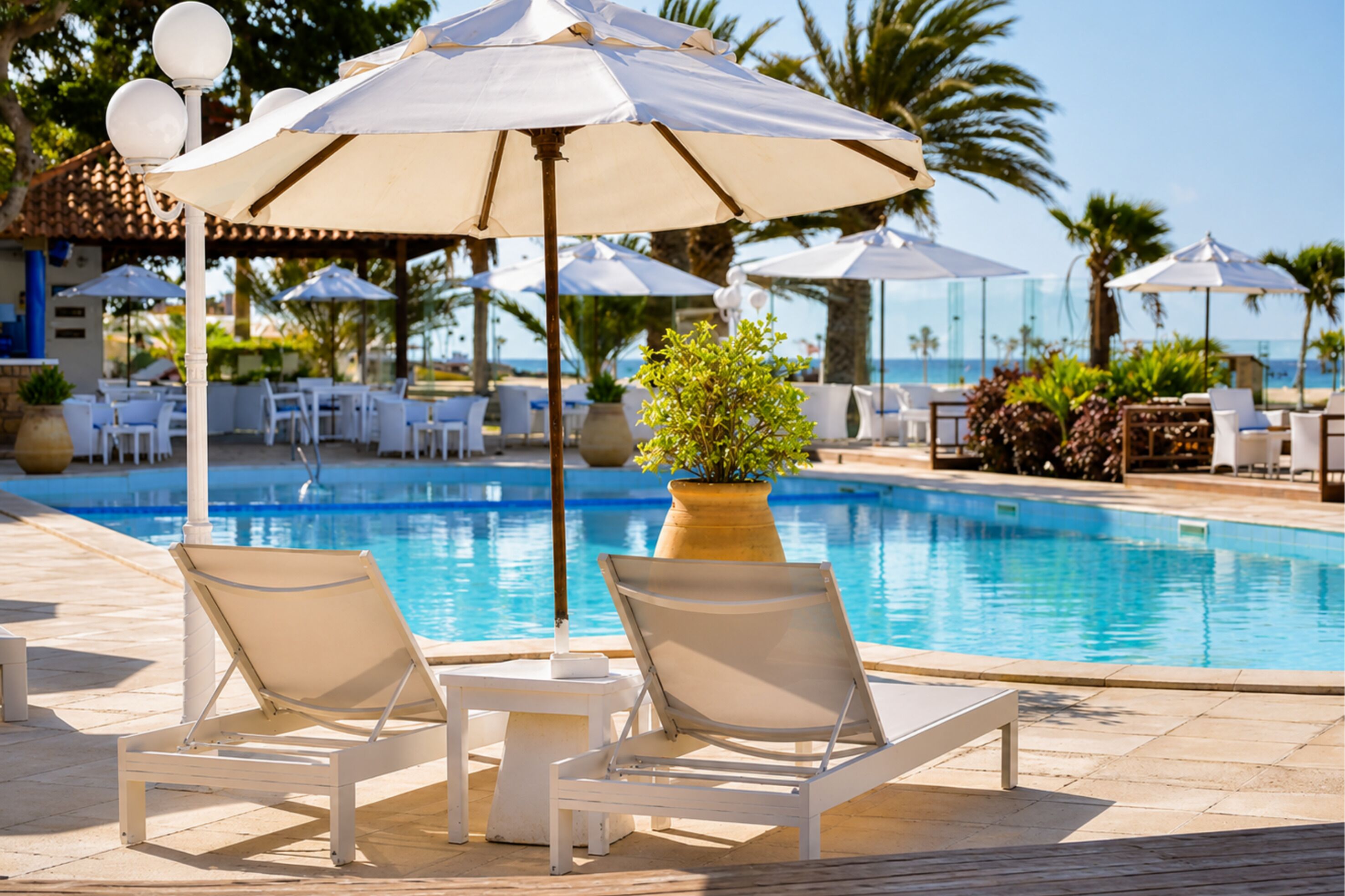 3 outdoor pools, pool umbrellas, sun loungers