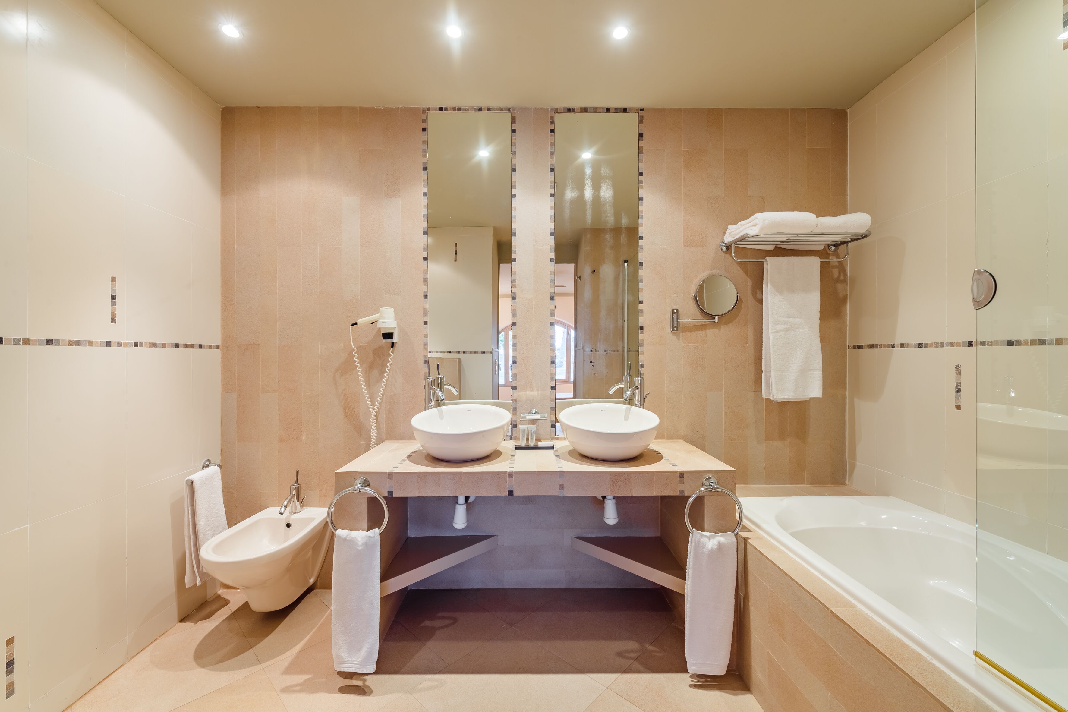 junior suite, beachside | bathroom | separate bathtub and shower, free toiletries, hair dryer, towels