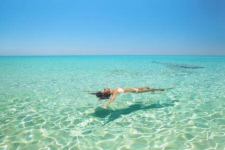 Plage, sable blanc. Hotel Riu Palace La Mola