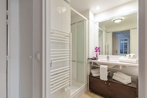 Separate tub and shower, eco-friendly toiletries, towels, toilet paper
